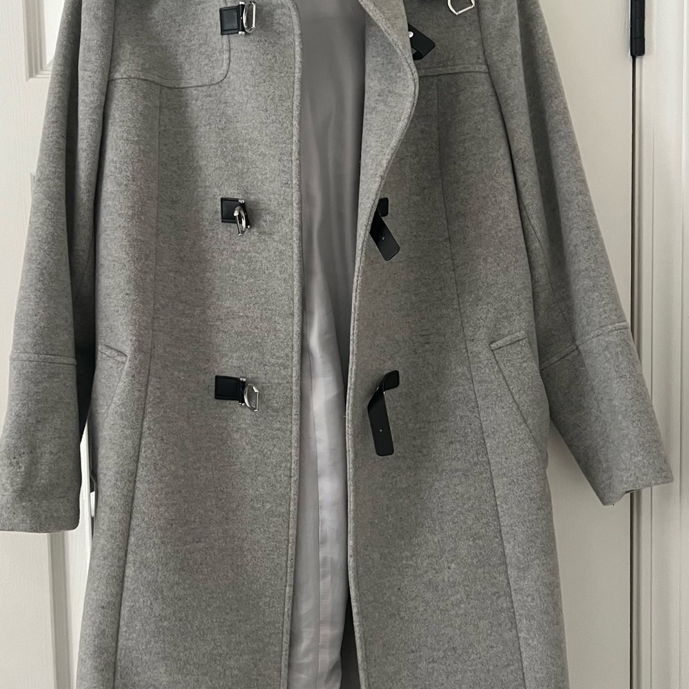 Purchased in Spain. Removable hood